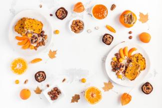fall/thanksgiving foods and leaves on a white background