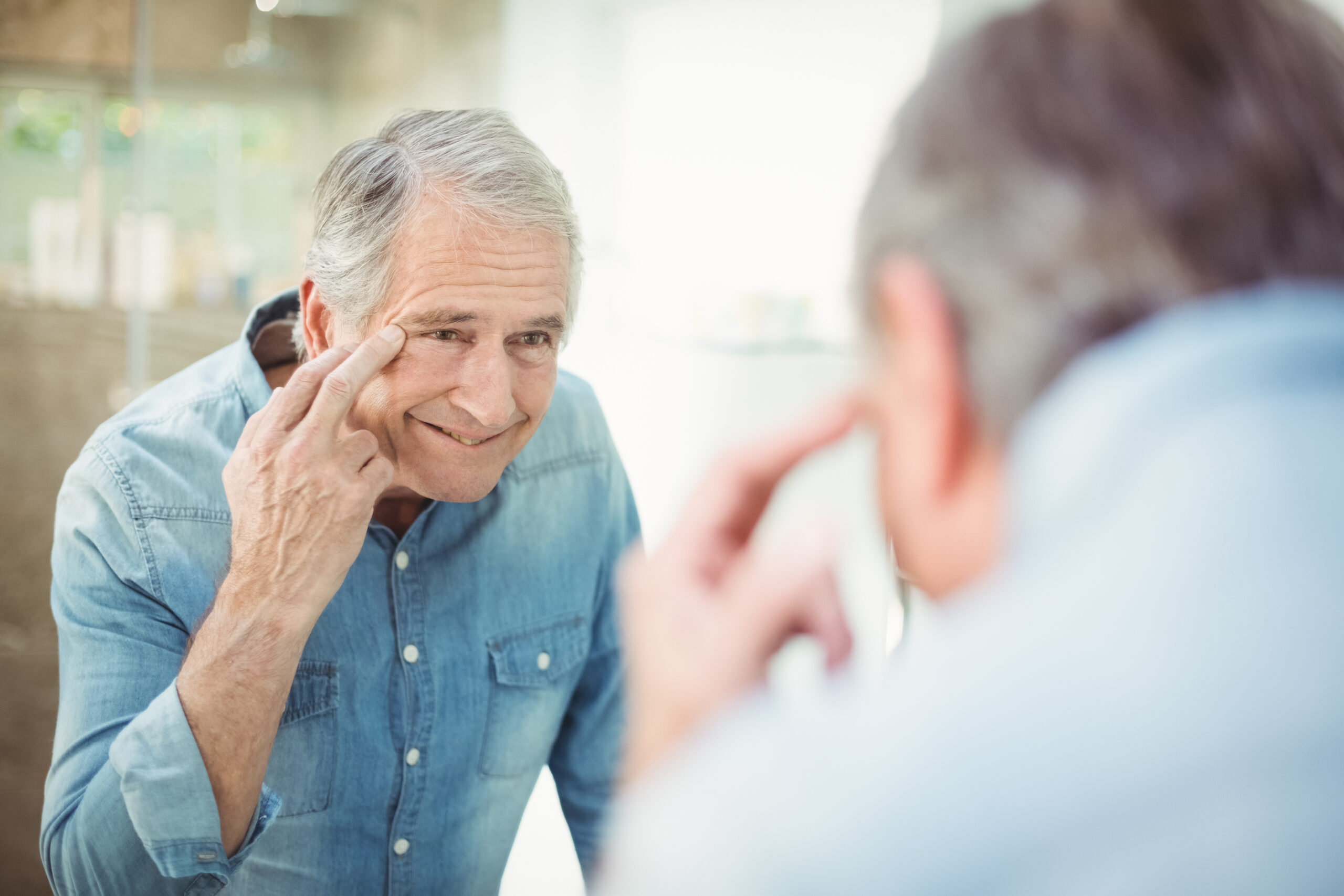 Man looking in mirror