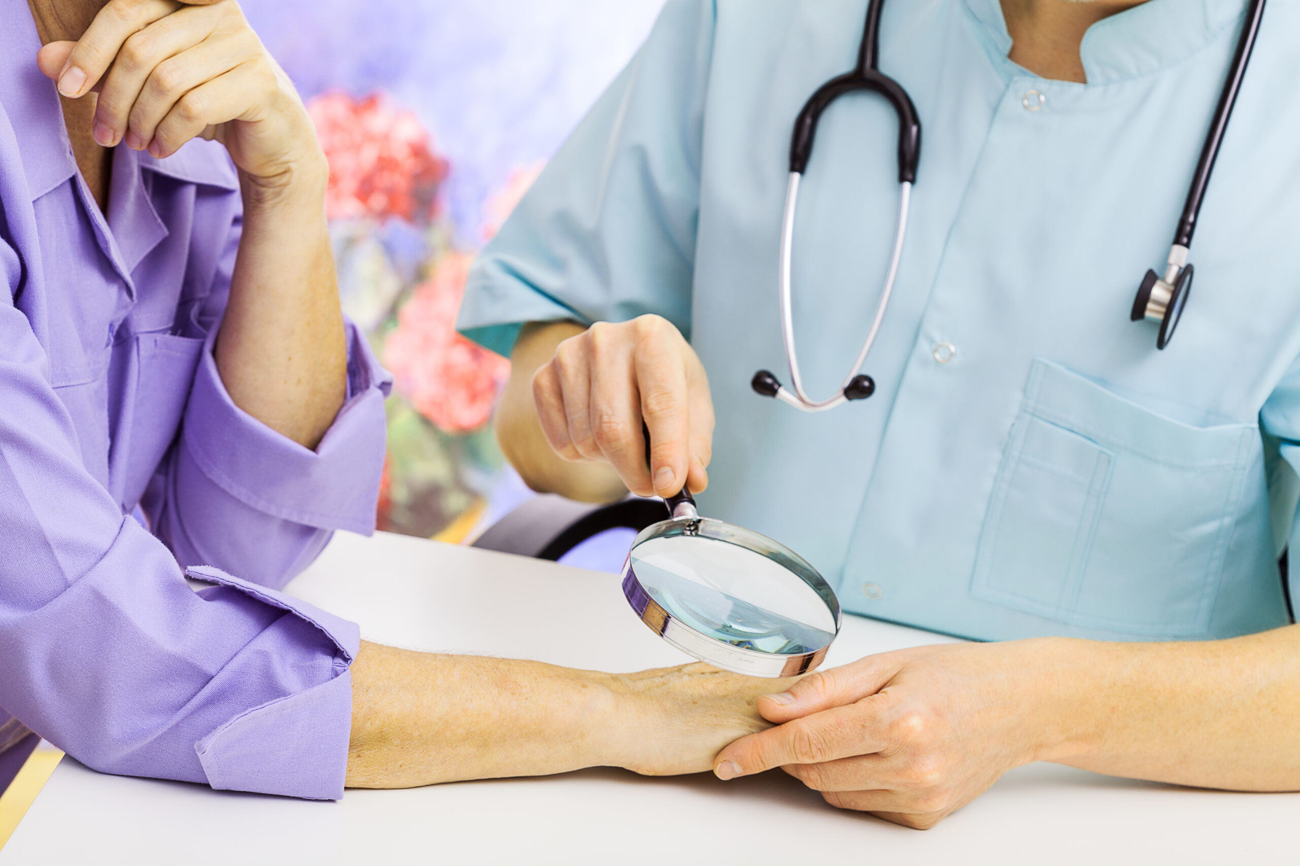 doctor examining the skin